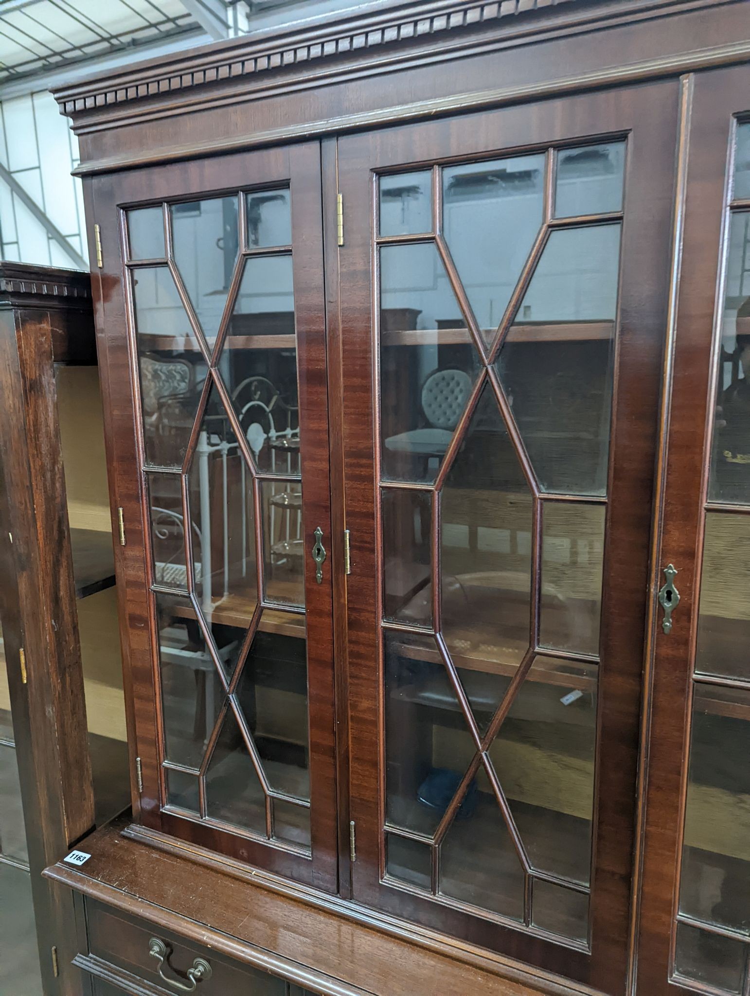 A reproduction George III style mahogany library bookcase, length 154cm, depth 41cm, height 193cm